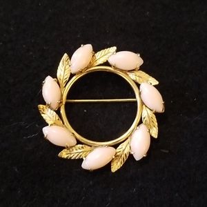 Vintage goldtone and pink brooch